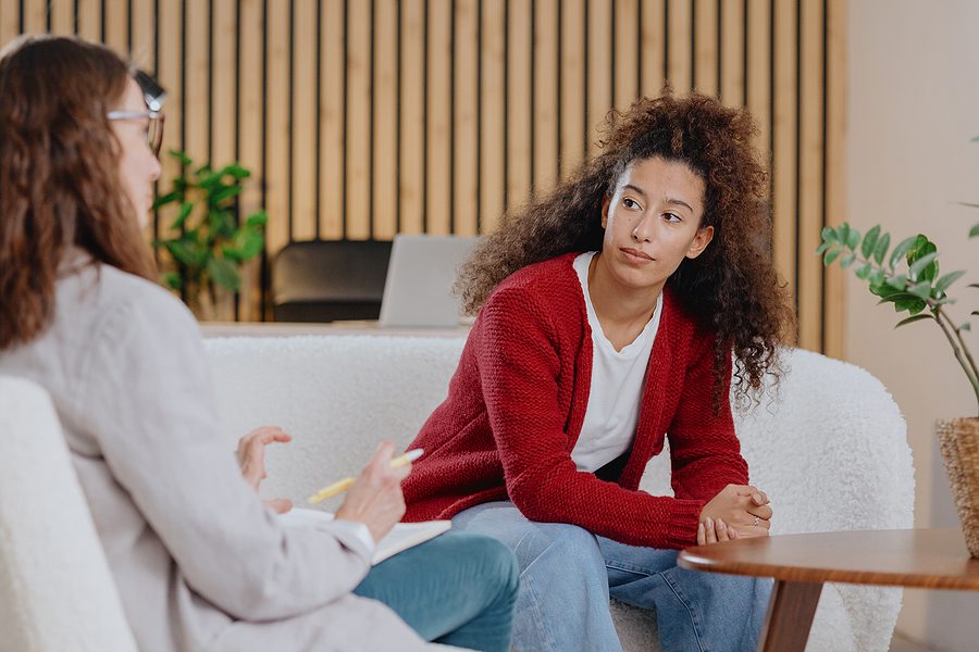 An adult in a one-to-one therapy session at Psycamore